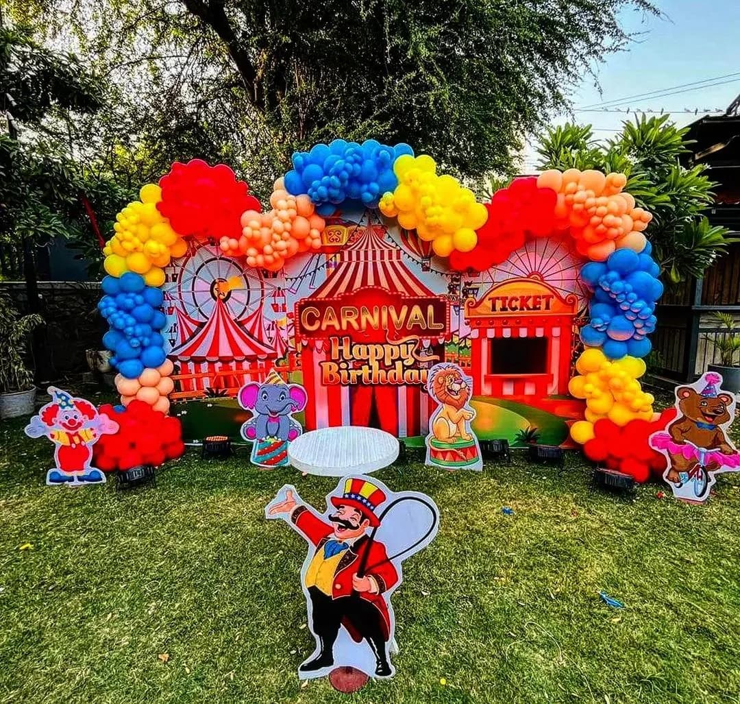 Grand Outdoor Carnival Circus Lawn Setup with Balloon Arch
